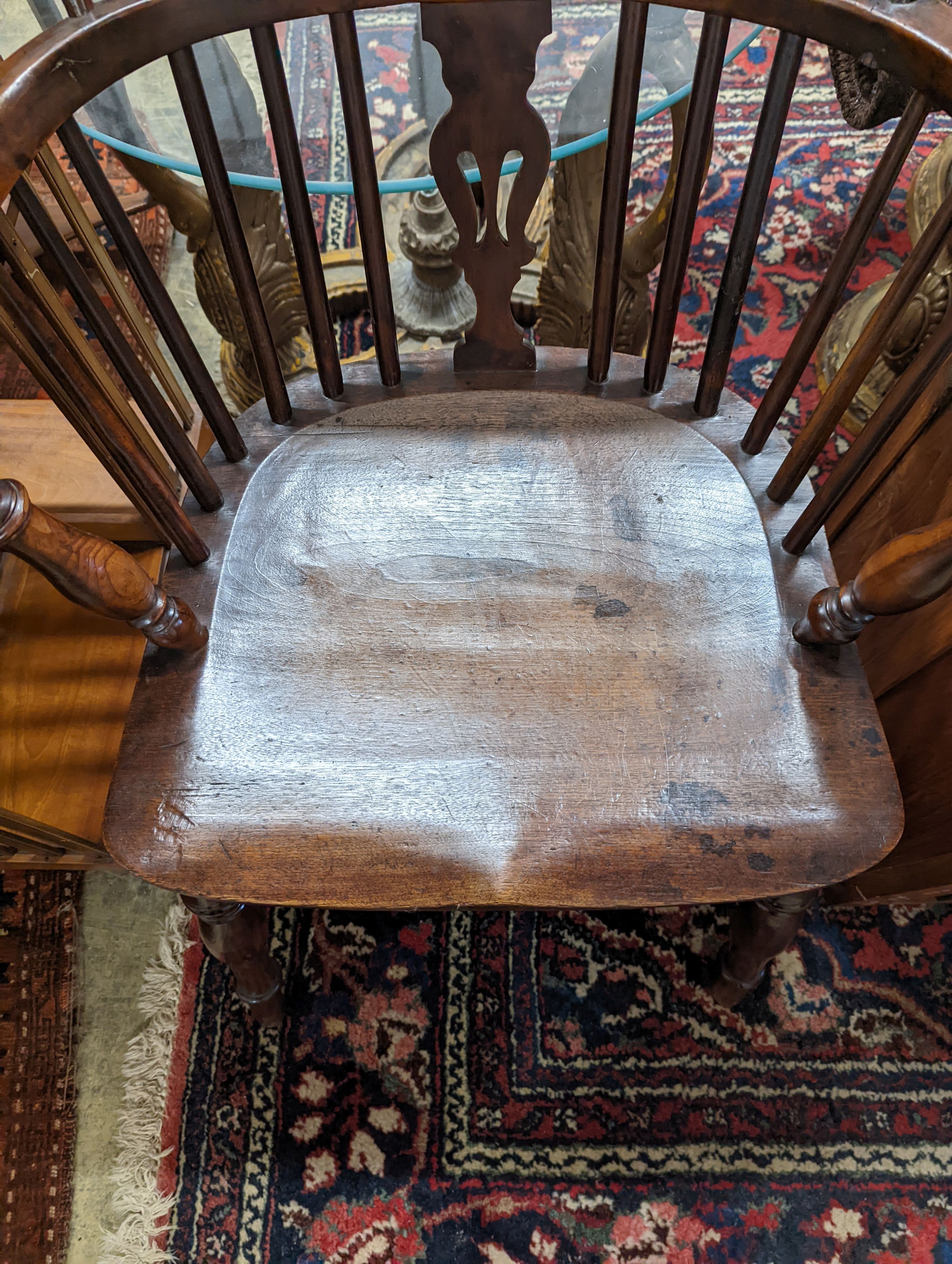 A mid 19th century Derbyshire area yew and elm Windsor elbow chair, width 57cm, depth 40cm, height 92cm